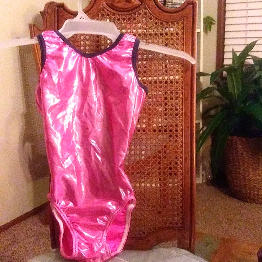 A fluorescent pink sparkly gymnastics suits.